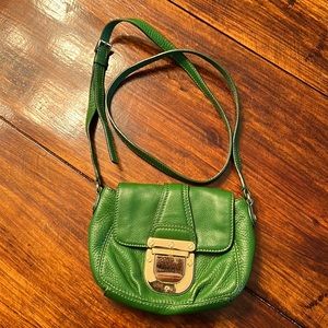 Green Michael Kors crossbody small purse with gold accents